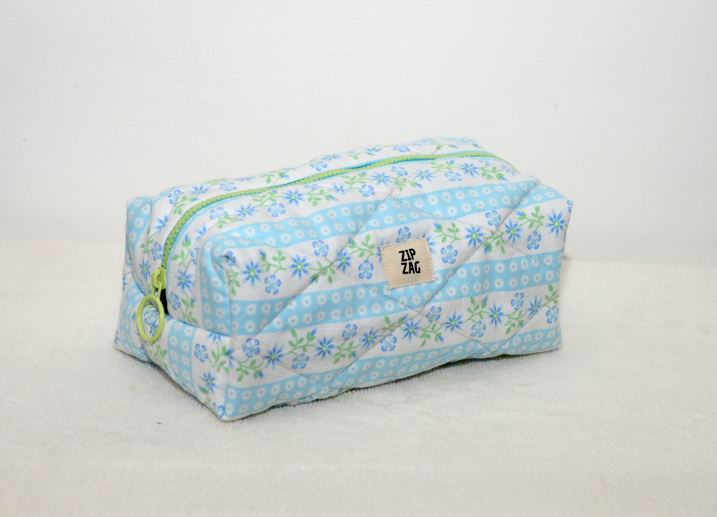 Trousse de toilette matelassée