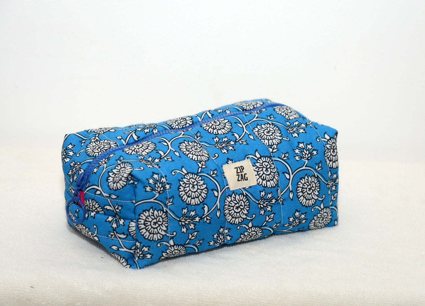 Trousse de toilette matelassée