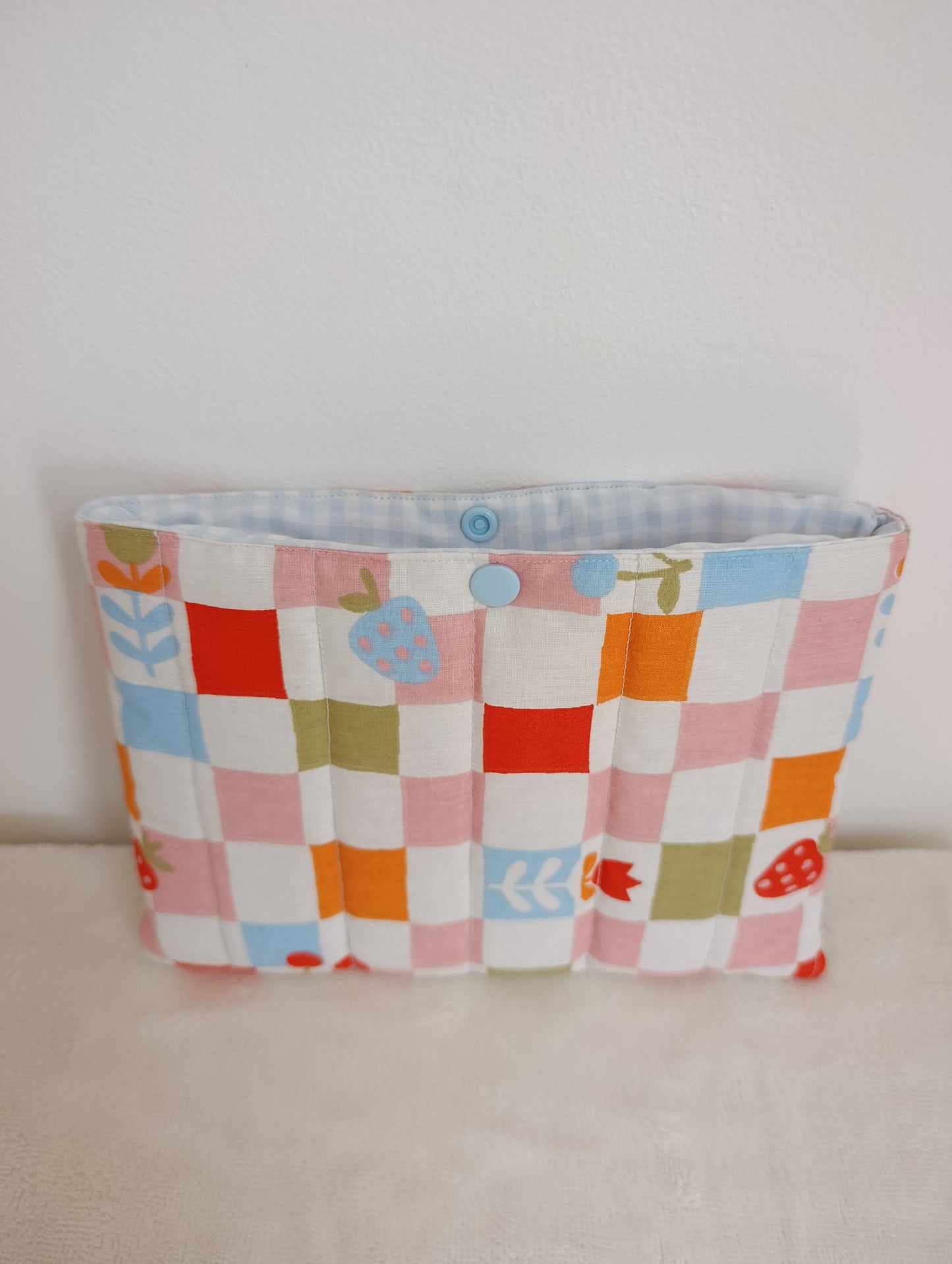 Pochette pour livre de poche matelassée