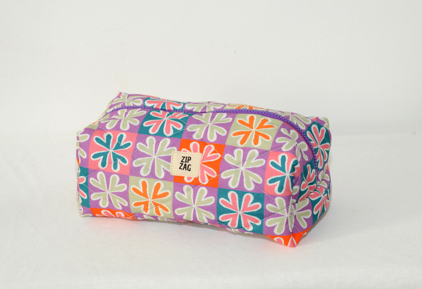 Trousse de toilette matelassée